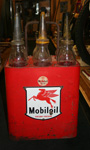Mobiloil Bottles in Stand